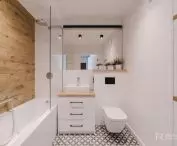 Bright bathroom with wooden accents