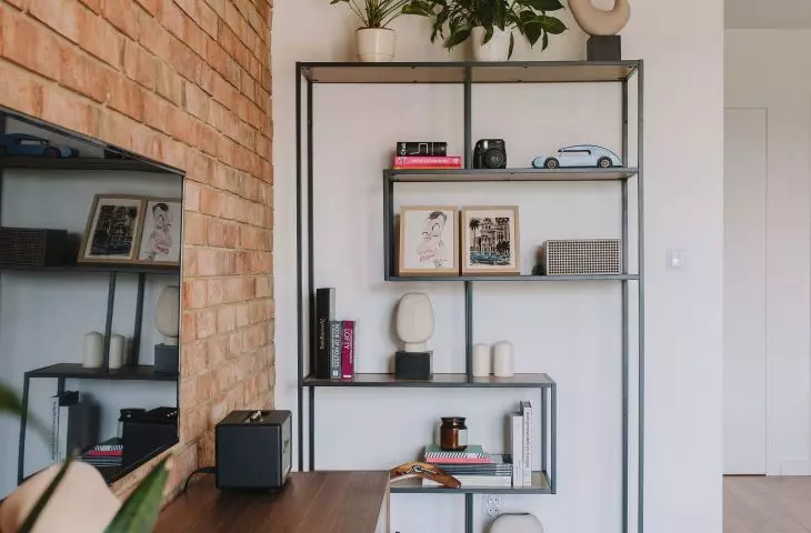 The apartment is maintained in an industrial style