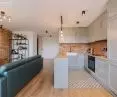 The apartment is maintained in subdued colors