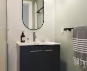 Bathroom in white, black and gray