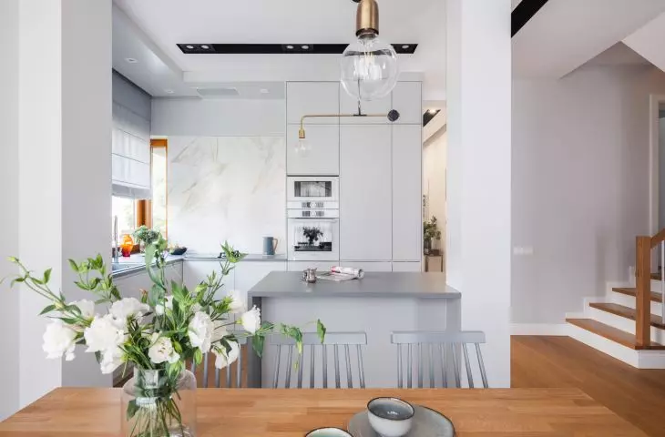 Functionally designed kitchen cabinets optically enlarge the space