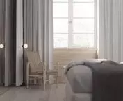 W największym pomieszczeniu zaaranżowano sypialnię 