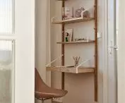 Suspended bookcase with office function