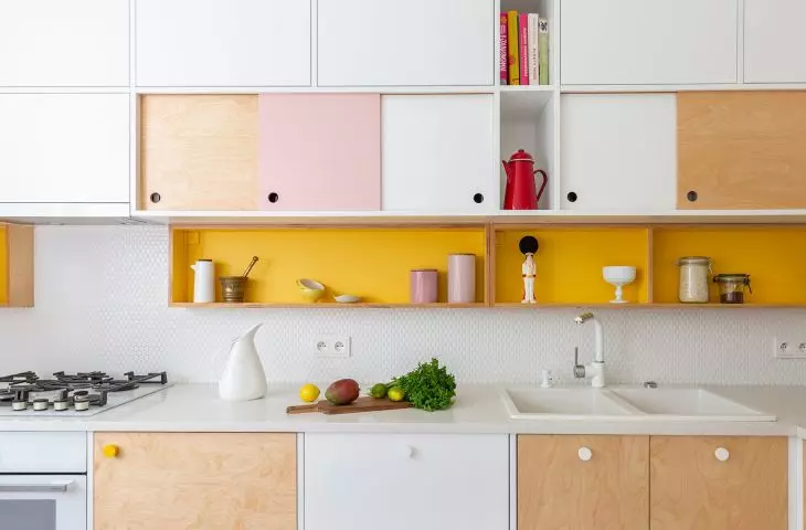 The kitchen furniture is made of birch plywood