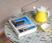Yellow accents appear in the interior