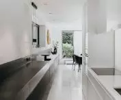 The kitchen blends seamlessly with the dining room