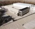 The project also includes a second production building