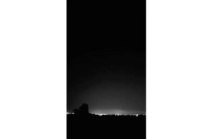 Theater of light, dark sky