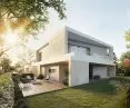 Staggered overhangs in two-family homes create different outdoor rest areas