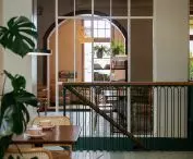 different parts of the restaurant are separated by a glass wall