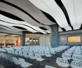 Spatial ceiling tiles by Knauf Ceiling Solutions in the conference room of a Warsaw office building