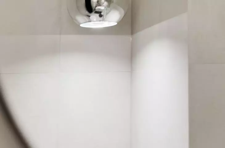 Silver lamp in the bathroom