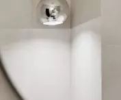 Silver lamp in the bathroom