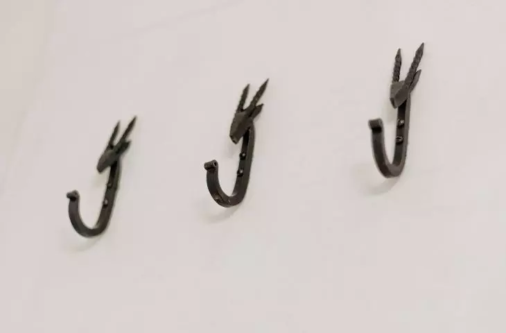 Wrought iron hooks in the bathroom