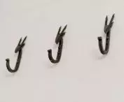 Wrought iron hooks in the bathroom
