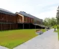 The buildings are reminiscent of a modern barn