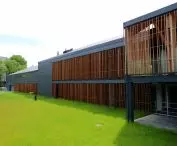 Facades are covered with slate and wood