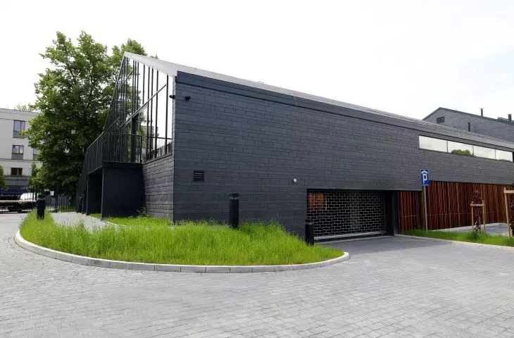 Minimalist facade and large glazings