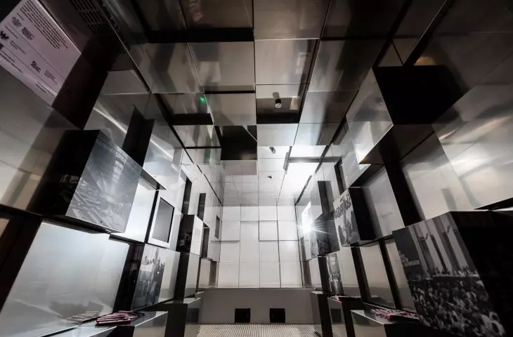 the walls are decorated with steel pixels - cubic blocks on which information on the events of 1980 was placed