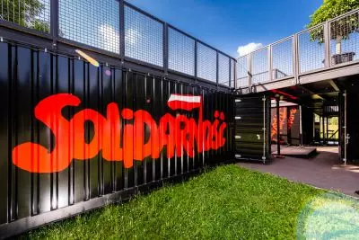 black containers adorn the distinctive Solidarity sign czarne containers adorn the distinctive Solidarity sign