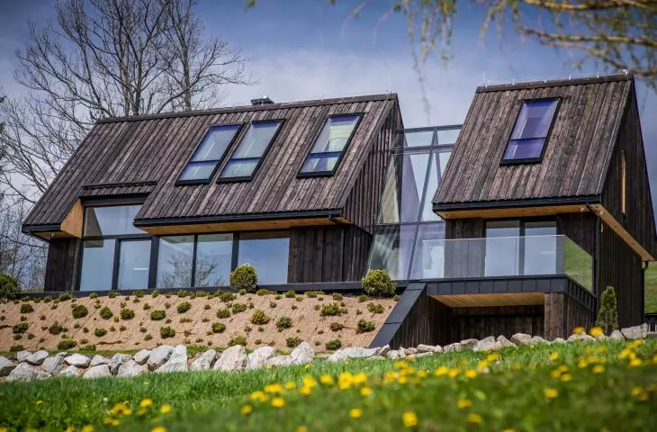 The design uses large glazing