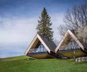The houses are reminiscent of mountain huts in appearance