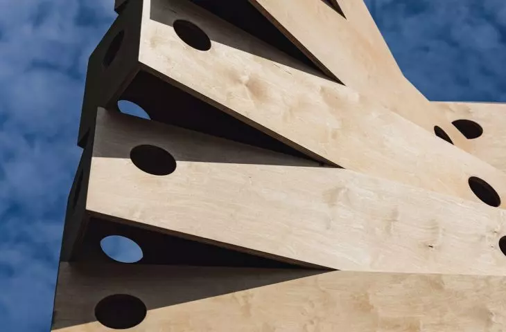 The installation is made up of three towers built from simple benches of waterproof plywood