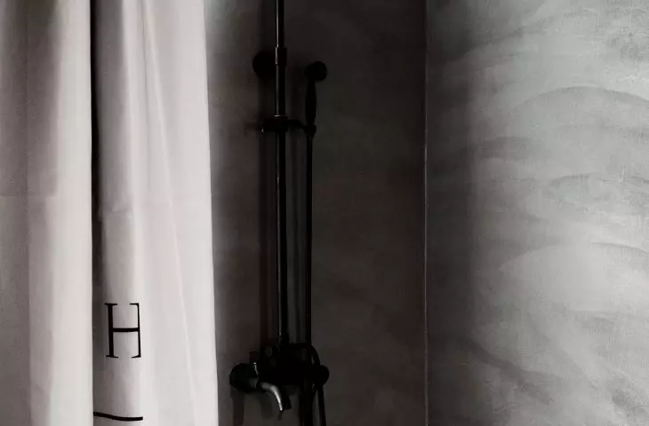 Shower in a black and white bathroom