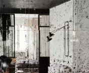 A wall of mirrors in the living room
