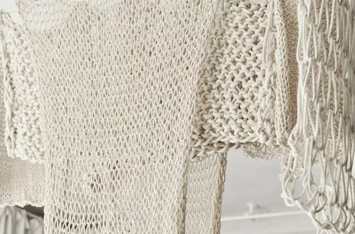 White macramé in the bedroom creates a lamp