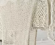 White macramé in the bedroom creates a lamp