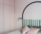 zaokrąglony zagłówek łóżka w sypialni