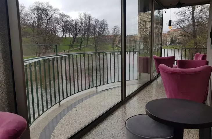 on the balcony protruding over the moat, a balustrade with holes for milk cups has been preserved