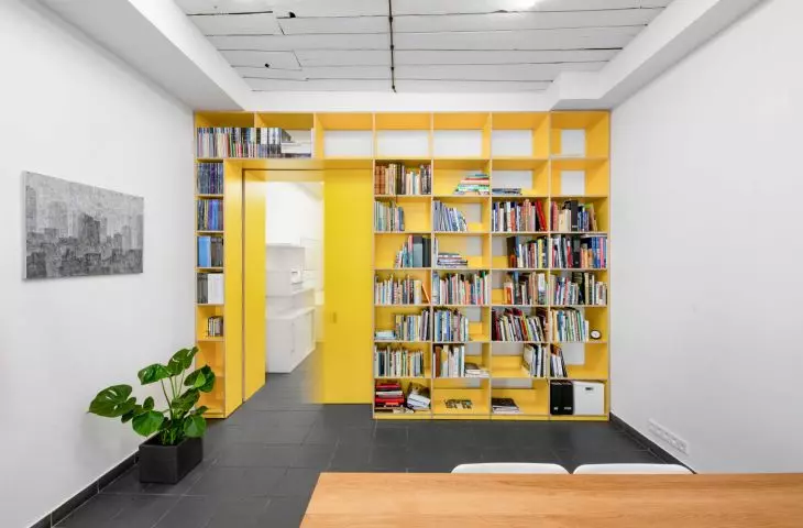 conference room with yellow bookcase