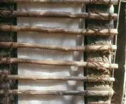 Construction detail of Hut Petite Ferme - local woods connected by coconut ropes