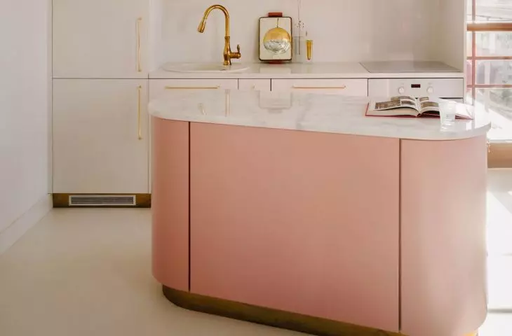 Apartment in Wola, kitchen with pink island