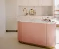 Apartment in Wola, kitchen with pink island
