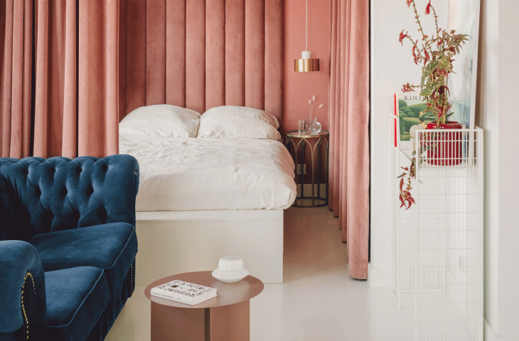 Bedroom hidden behind a curtain