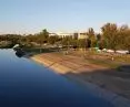 The east bank of the Warta River at the level of the Polytechnic.