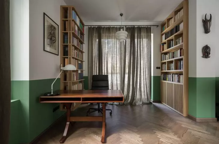 in the living room there is a separate place to work