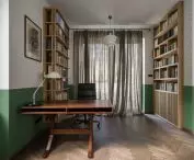 in the living room there is a separate place to work