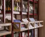 Shelves full of wine and vinyl records