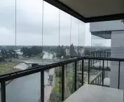 Lumon frameless balcony glazing systems