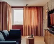 Orange curtains add warmth