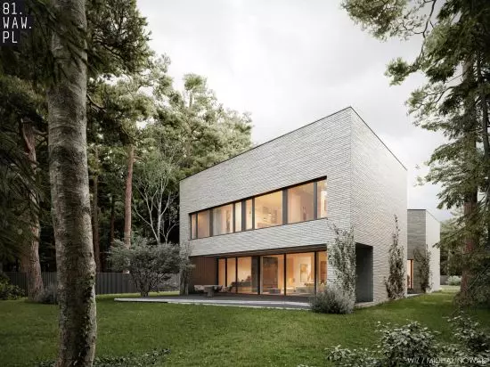 panoramiczne glazing invites the forest inside the house