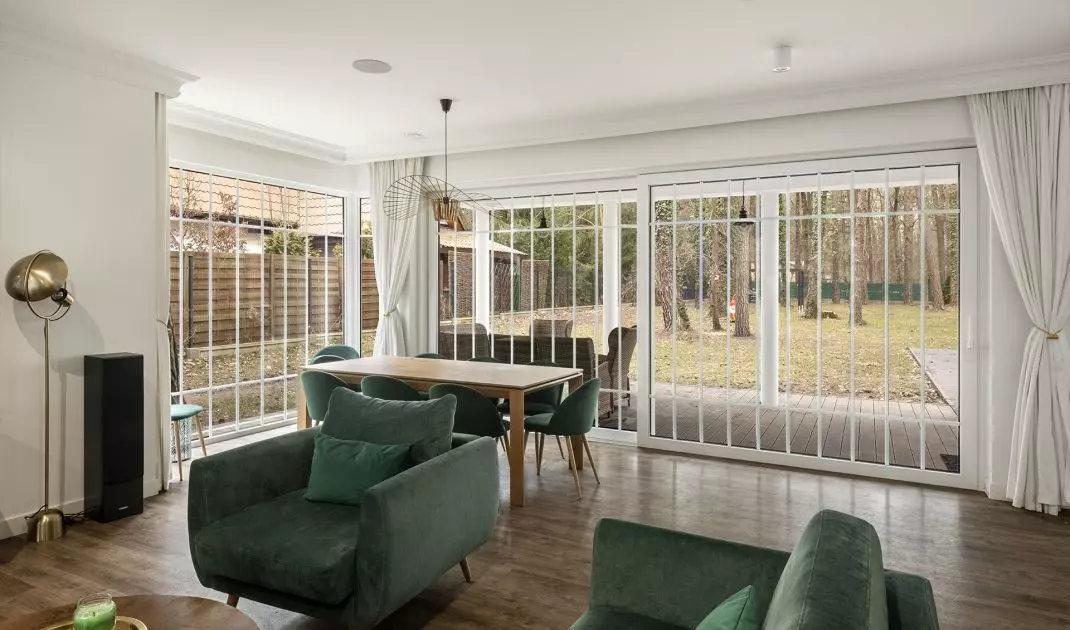 Windows with muntin bars make the interiors take on an original look and character