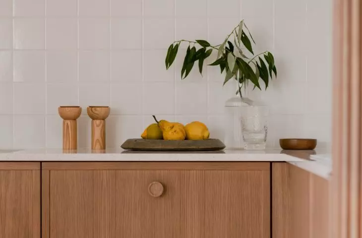 A fragment of a kitchen built-in. Veneer drawers