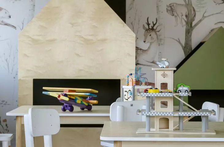 in the forest-inspired room, pillows resemble stones