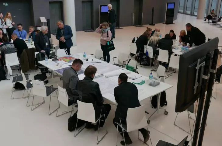 At the urban planning workshop, three groups work in parallel