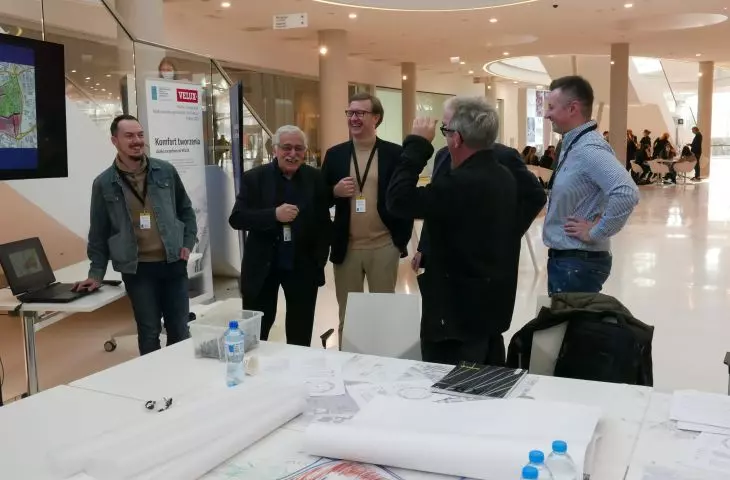 Workshop participants include: Romuald Loegler and Łukasz Maślona